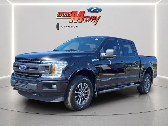 2020 Ford F-150 XLT in Black Metallic — front three-quarter view