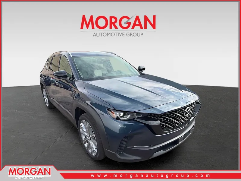 2026 Mazda CX-50 2.5 S Premium in Ingot Blue Metallic — front three-quarter view