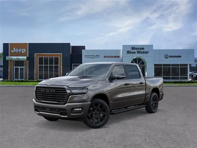 2026 RAM Ram 1500 RAM 1500 LARAMIE CREW CAB 4X4 5'7' BOX in Granite Crystal Metallic Clear-Coat Exterior Paint — front three-quarter view