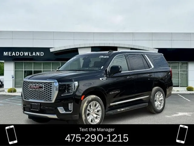 2024 GMC Yukon Denali in Onyx Black — front three-quarter view