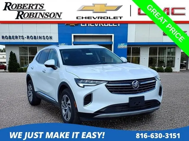 2023 Buick Envision Essence in Summit White — front three-quarter view