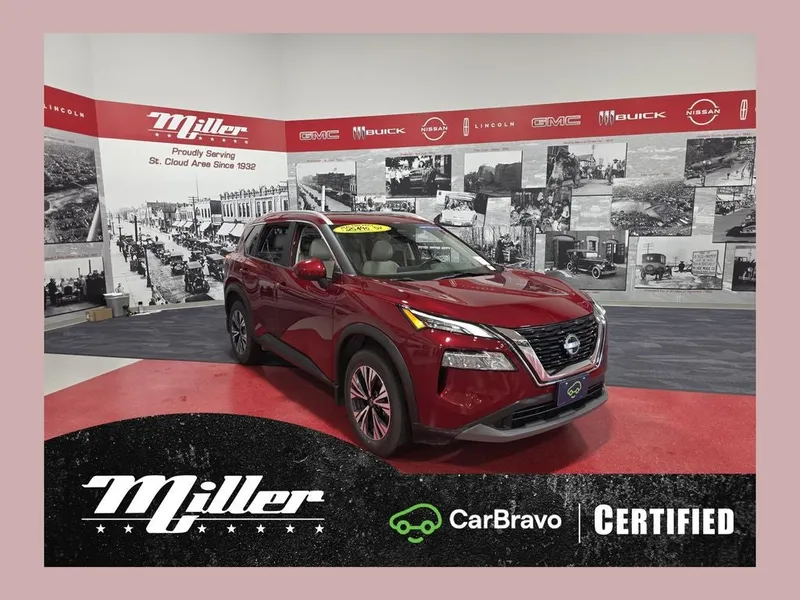 2023 Nissan Rogue SV CarBravo Certified in Scarlet Ember Tintcoat — front three-quarter view
