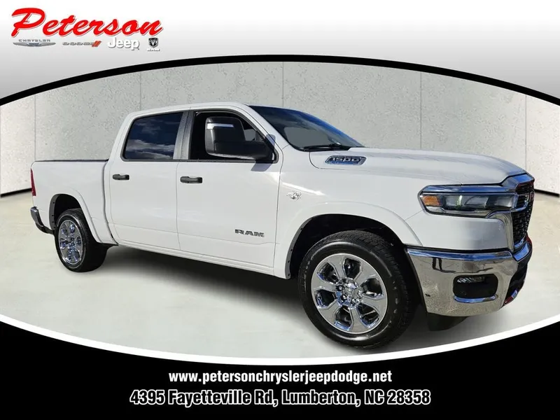 2026 RAM Ram 1500 RAM 1500 BIG HORN CREW CAB 4X4 5'7' BOX in Bright White Clear-Coat Exterior Paint — front three-quarter view