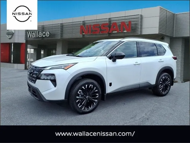 2026 Nissan Rogue Dark Armor in Everest White — front three-quarter view