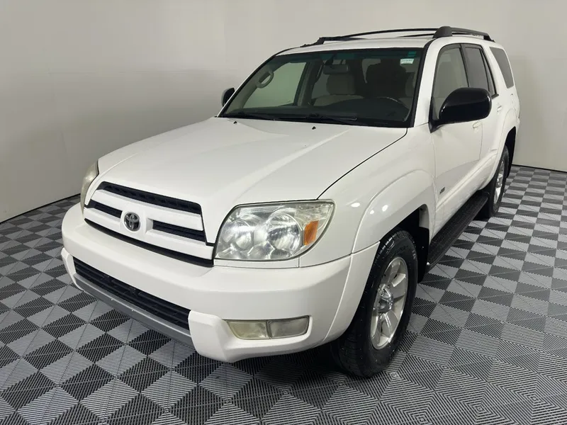2004 Toyota 4Runner SR5 in White — front three-quarter view