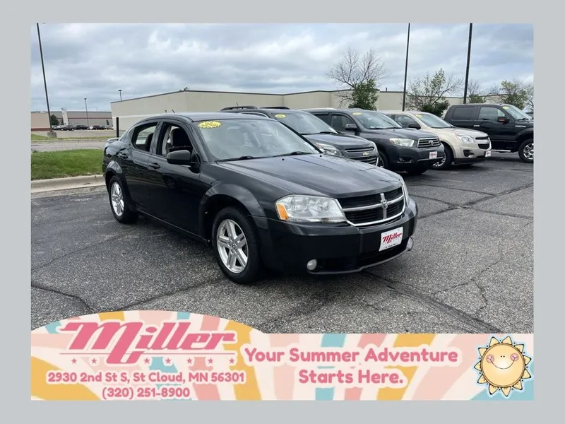 2010 Dodge Avenger R/T in Brilliant Black Crystal Pearlcoat — front three-quarter view