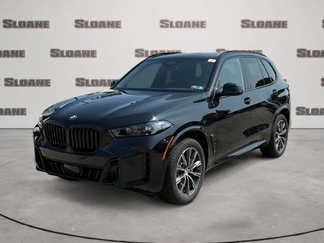 2026 BMW X5 xDrive40i in Black Sapphire Metallic — front three-quarter view