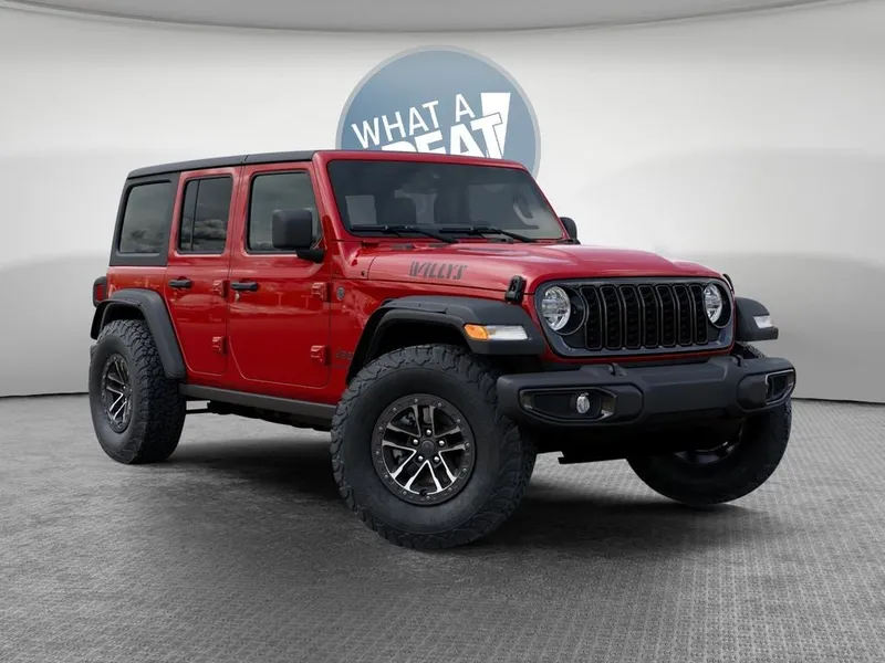 2026 Jeep Wrangler Willys in Firecracker Red Clear-Coat Exterior Paint — front three-quarter view