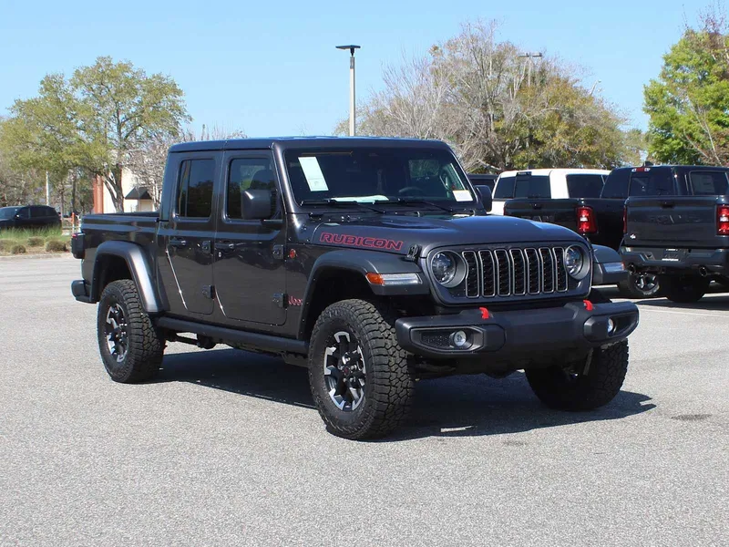 2026 Jeep Gladiator Rubicon in Granite Crystal Metallic Clear-Coat Exterior Paint — front three-quarter view