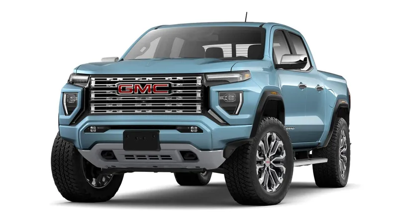2026 GMC Canyon Denali in Glacier Metallic — front three-quarter view