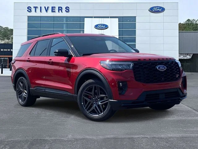 2026 Ford Explorer ST in Rapid Red Metallic Tinted Clearcoat — front three-quarter view