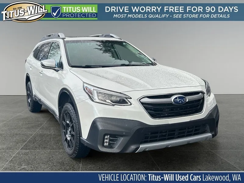 2022 Subaru Outback Touring XT in Crystal White Pearl — front three-quarter view