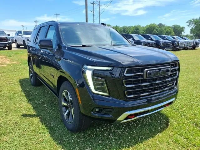 2026 GMC Yukon AT4 Ultimate in Onyx Black — front three-quarter view