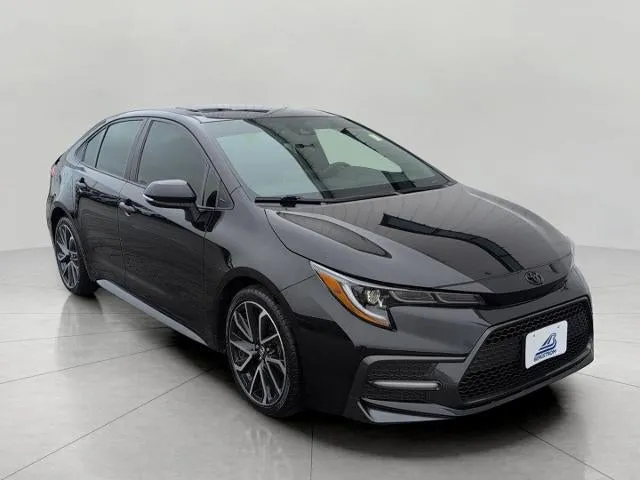 2020 Toyota Corolla SE in Black Sand Pearl — front three-quarter view