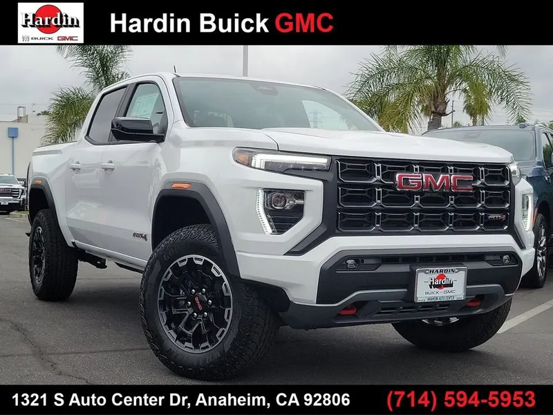 2026 GMC Canyon AT4 in Summit White — front three-quarter view