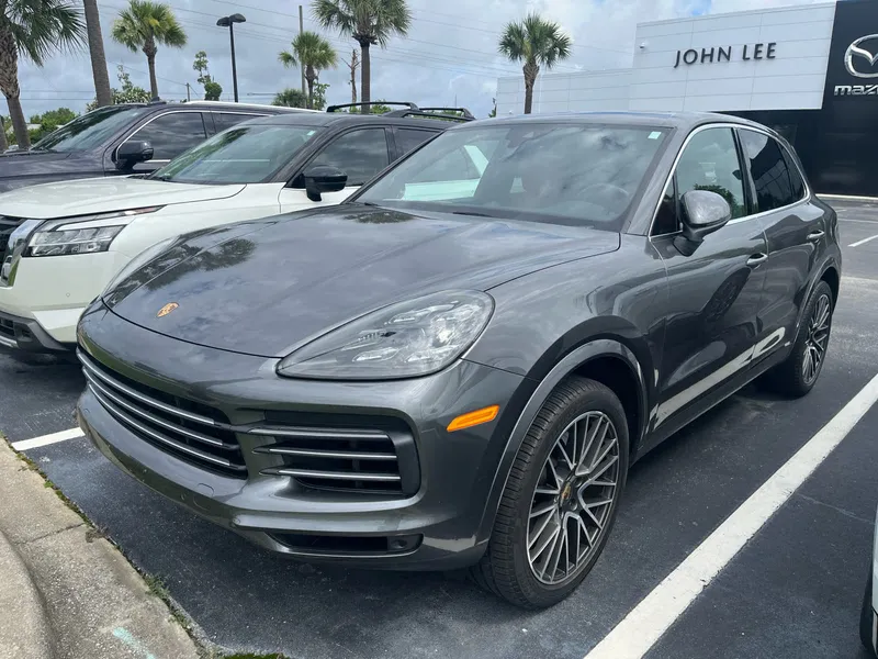 2019 Porsche Cayenne Base in Quartzite Metallic — front three-quarter view
