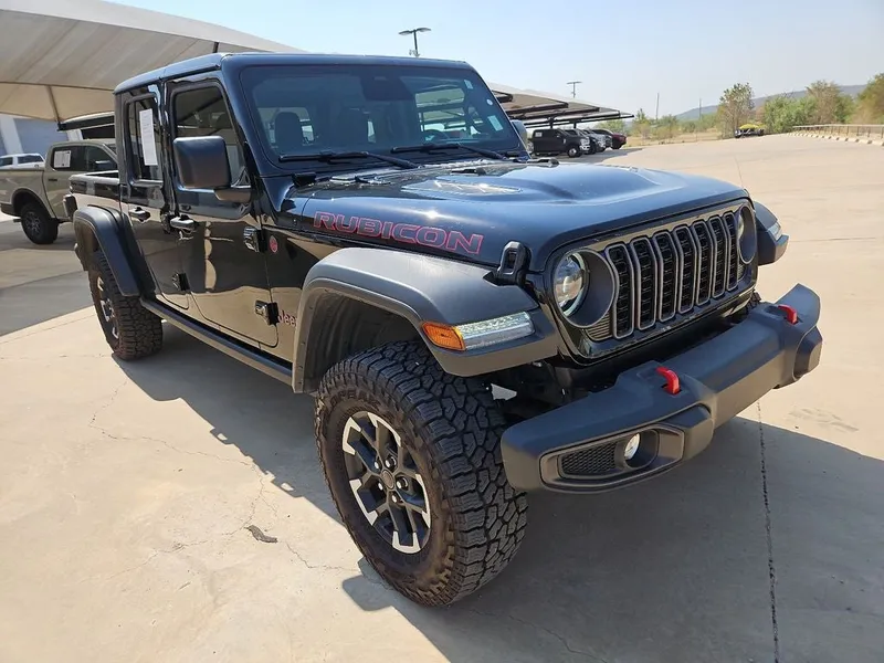 2026 Jeep Gladiator Rubicon in Black Clearcoat — front three-quarter view