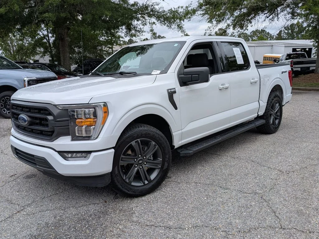 2023 Ford F-150 XLT in White — front three-quarter view