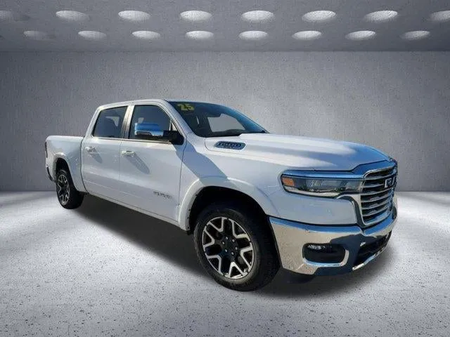 2025 RAM 1500 Laramie in White — front three-quarter view