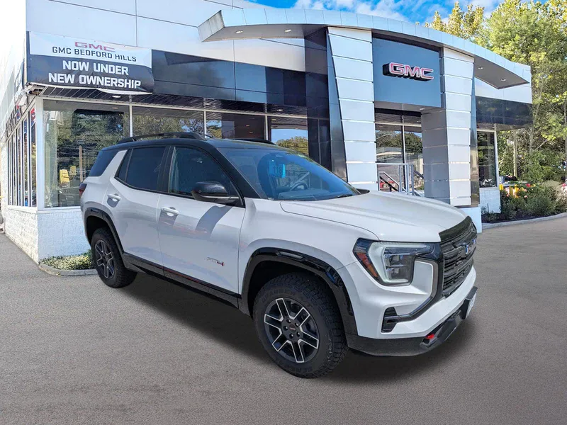 2026 GMC Terrain AWD AT4 in Summit White — front three-quarter view