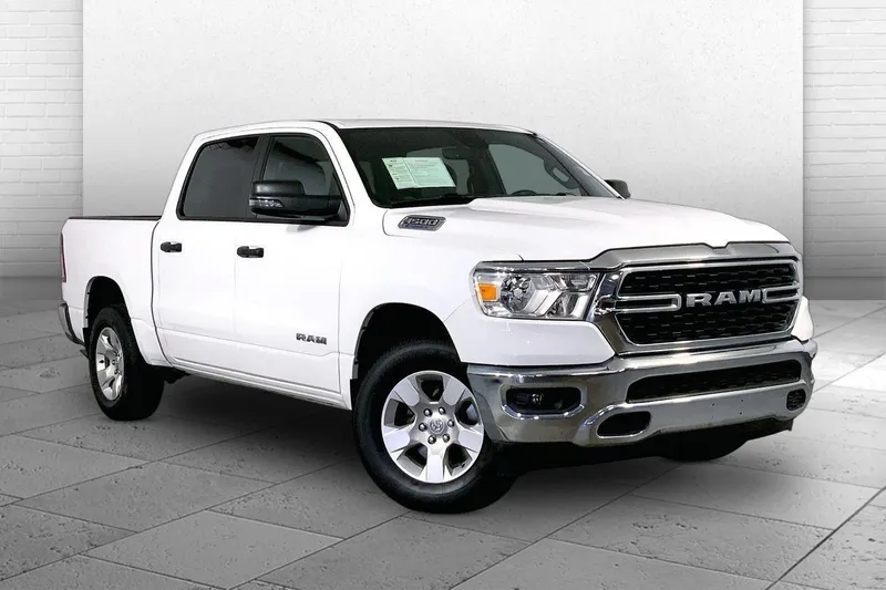 2023 RAM 1500 Big Horn Crew Cab 4x4 5'7' Box in Bright White Clearcoat — front three-quarter view