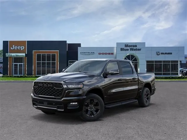 2026 RAM Ram 1500 RAM 1500 BIG HORN CREW CAB 4X4 5'7' BOX in Diamond Black Crystal Pearl-Coat Exterior Paint — front three-quarter view