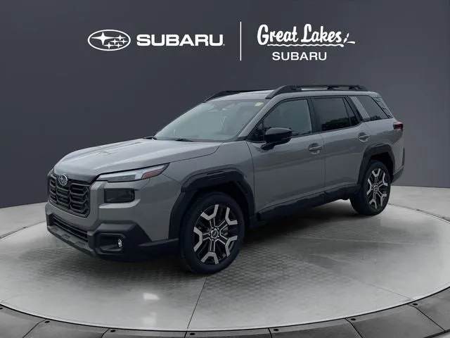 2026 Subaru OUTBACK Touring XT in River Rock Pearl — front three-quarter view