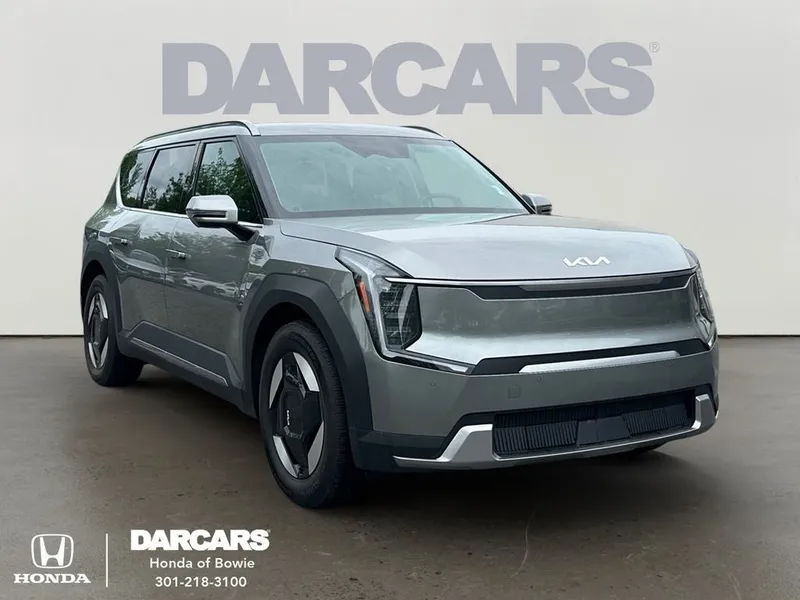 2024 Kia EV9 Wind in Pebble Gray — front three-quarter view