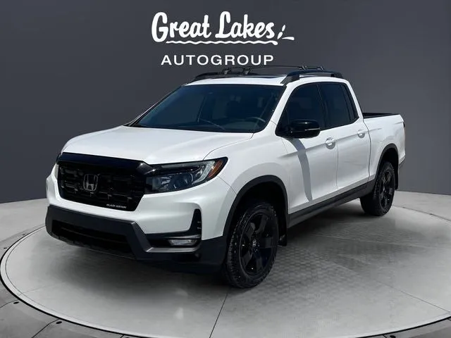 2025 Honda Ridgeline Black Edition in Platinum White Pearl — front three-quarter view