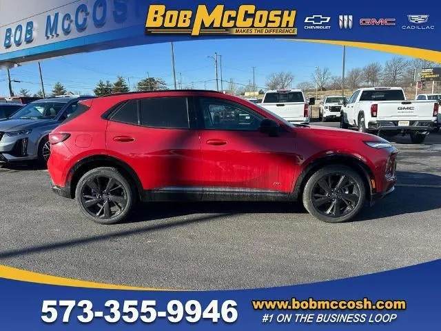 2025 Buick Envision Sport Touring in Brilliant Red — front three-quarter view