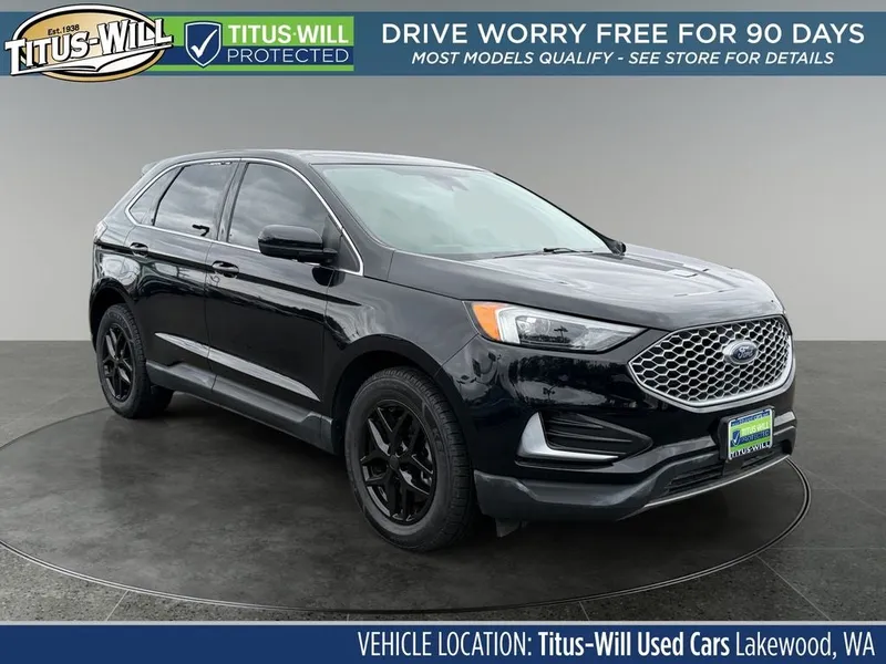 2024 Ford Edge SEL in Black Metallic — front three-quarter view