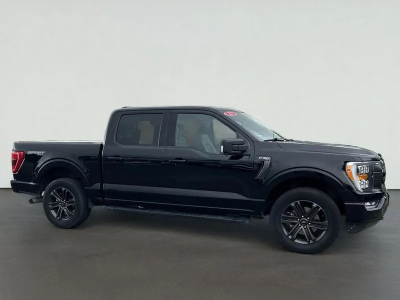2021 Ford F-150 XLT in Black — front three-quarter view