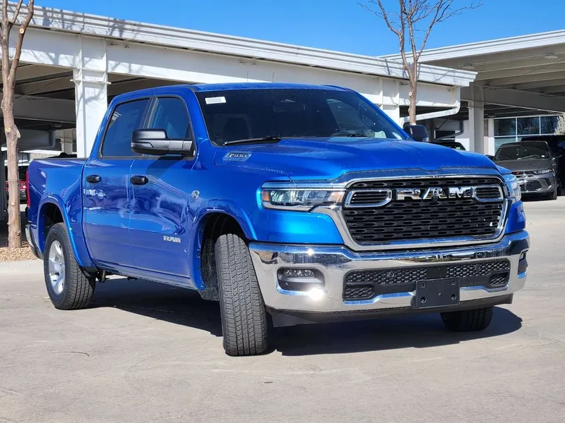 2026 RAM 1500 RAM 1500 BIG HORN CREW CAB 4X4 5'7' BOX in Hydro Blue Pearl-Coat Exterior Paint — front three-quarter view