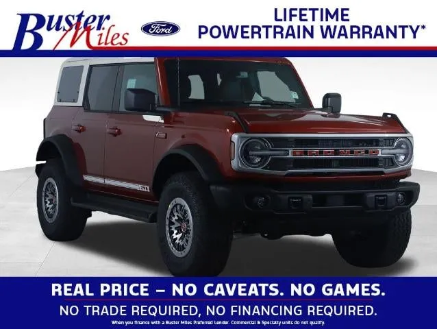 2026 Ford Bronco Outer Banks in Ruby Red Metallic Tinted Clearcoat — front three-quarter view