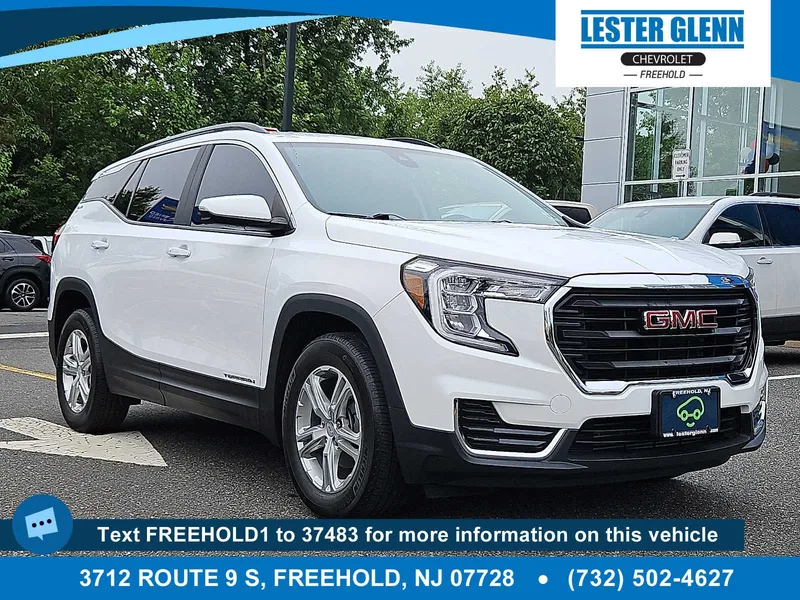 2023 GMC Terrain SLE in Summit White — front three-quarter view