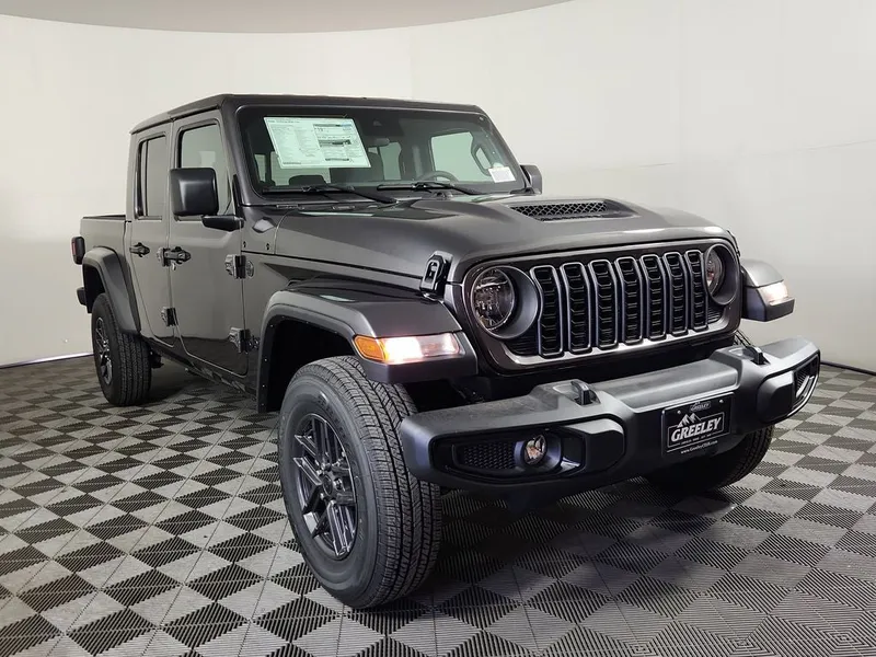 2025 Jeep Gladiator GLADIATOR SPORT S 4X4 in Granite Crystal Metallic Clear-Coat Exterior Paint — front three-quarter view
