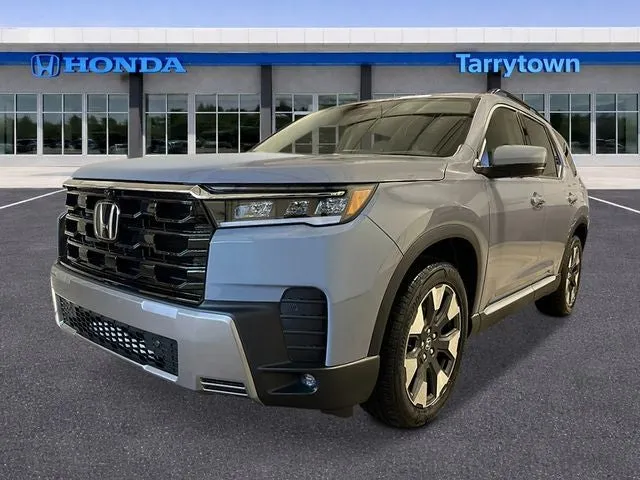 2026 Honda Pilot AWD Touring in Sonic Gray Pearl — front three-quarter view