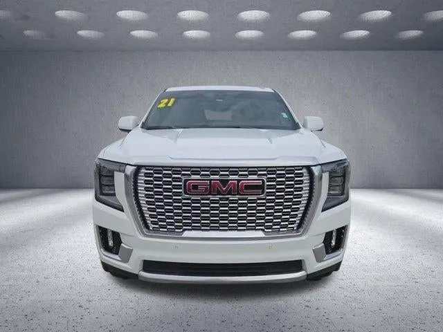 2021 GMC Yukon Denali in Summit White — front three-quarter view