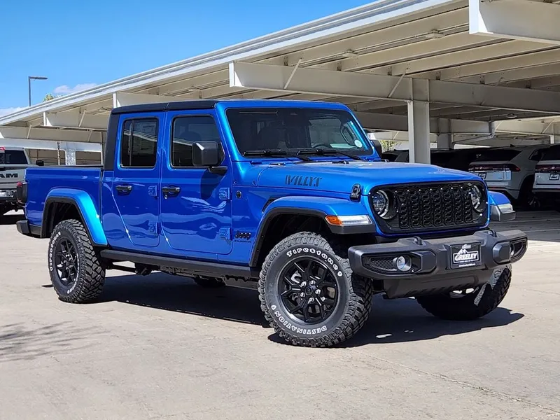 2026 Jeep Gladiator GLADIATOR WILLYS 4X4 in Hydro Blue Pearl-Coat Exterior Paint — front three-quarter view