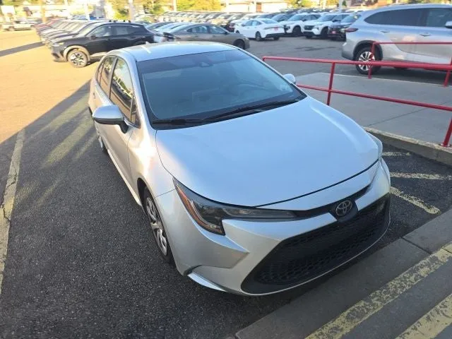 2021 Toyota Corolla LE in Classic Silver Metallic — front three-quarter view