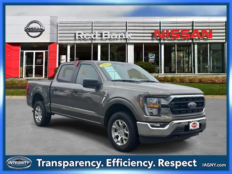 2023 Ford F-150 XLT in Stone Gray Metallic — front three-quarter view
