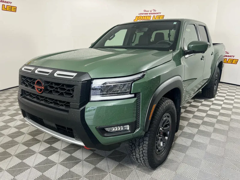 2025 Nissan Frontier PRO-4X in Tactical Green Metallic — front three-quarter view