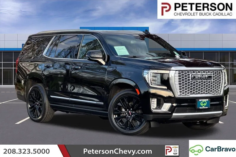 2021 GMC Yukon Denali in Onyx Black — front three-quarter view