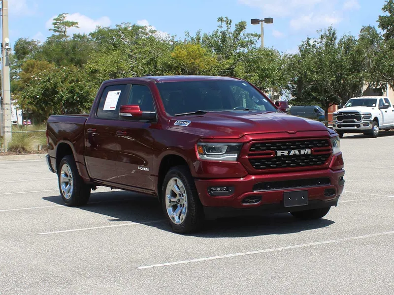 2022 RAM 1500 Big Horn in Delmonico Red Pearlcoat — front three-quarter view