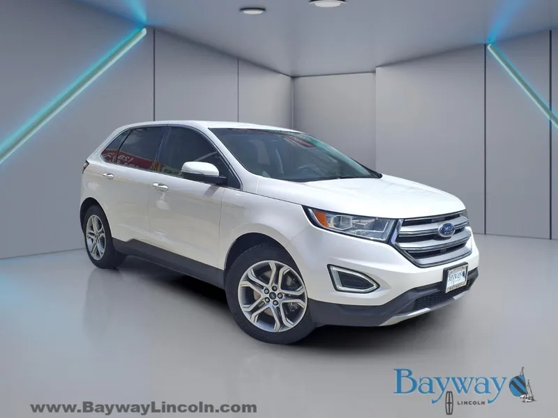 2018 Ford Edge Titanium in White Platinum Clearcoat Metallic — front three-quarter view