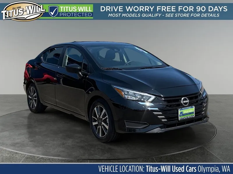 2025 Nissan Versa 1.6 SV in Super Black Metallic — front three-quarter view