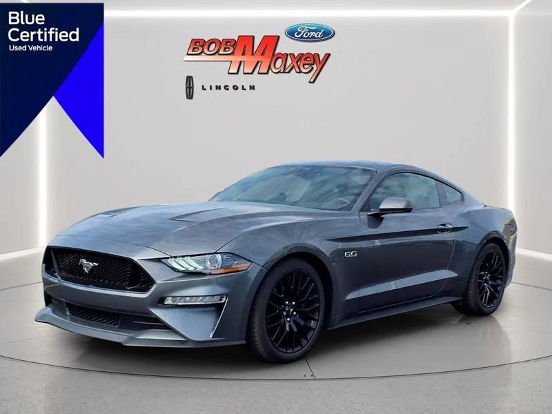 2022 Ford Mustang GT in Carbonized Gray M7 — front three-quarter view