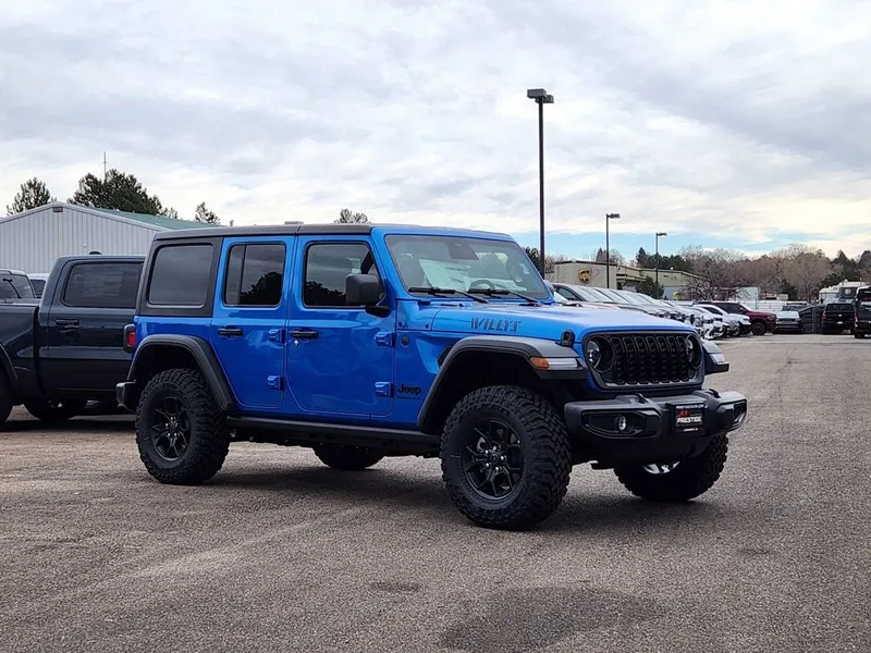 2026 Jeep Wrangler WRANGLER 4-DOOR WILLYS in Hydro Blue Pearl-Coat Exterior Paint — front three-quarter view