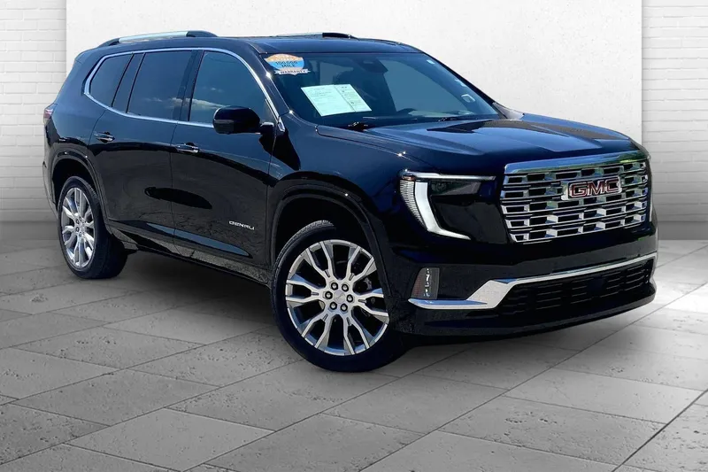 2025 GMC Acadia Denali in Ebony Twilight Metallic — front three-quarter view
