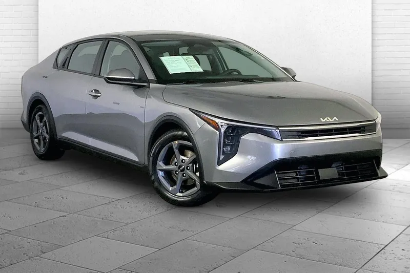 2025 Kia K4 LXS in Steel Gray — front three-quarter view